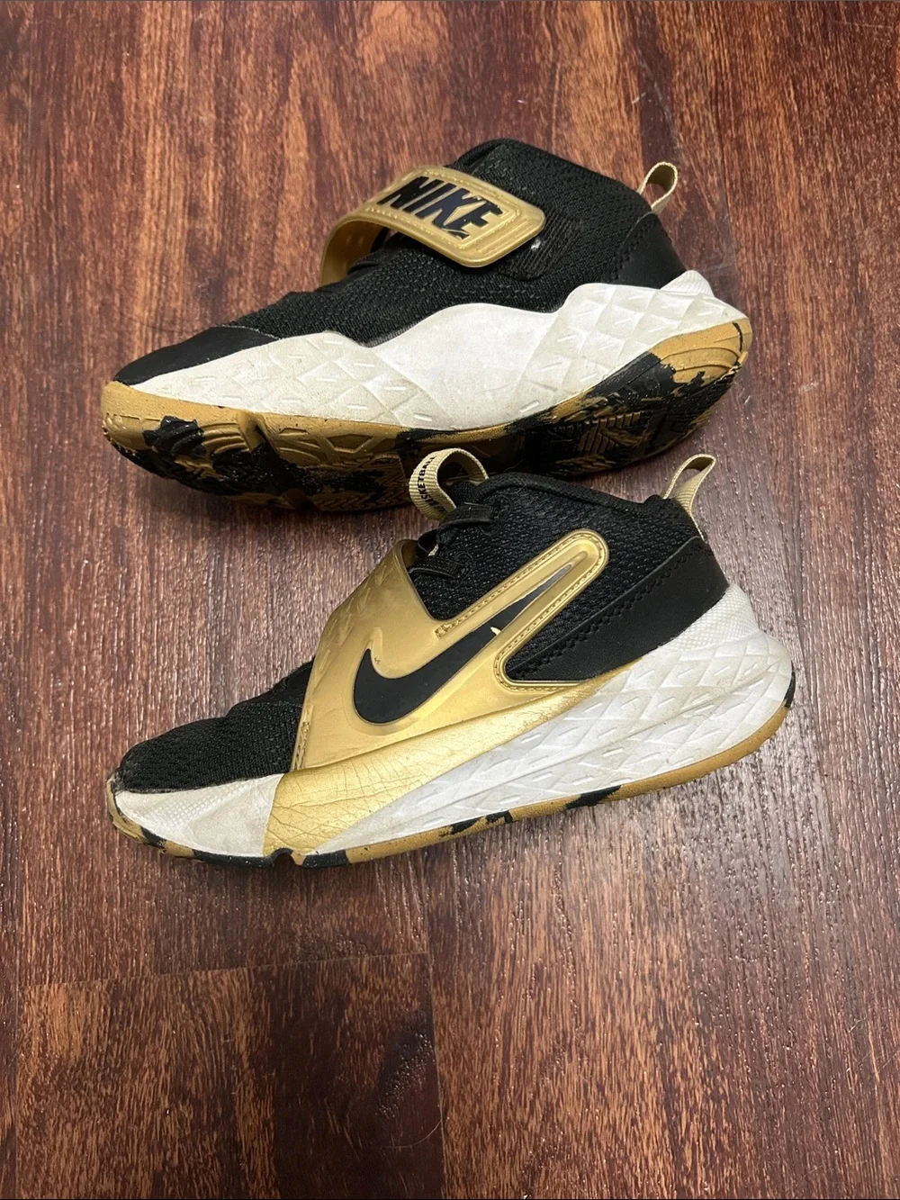 Nike Kids Black and Gold Strap Sneakers